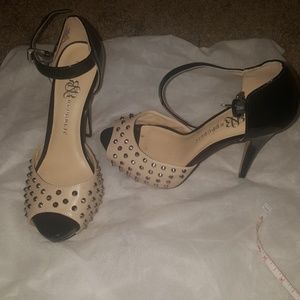 Studded nude and black peep toe heels